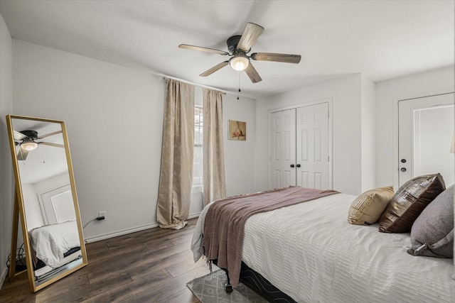 bedroom featuring baseboards, a closet, a ceiling fan, and wood finished floors