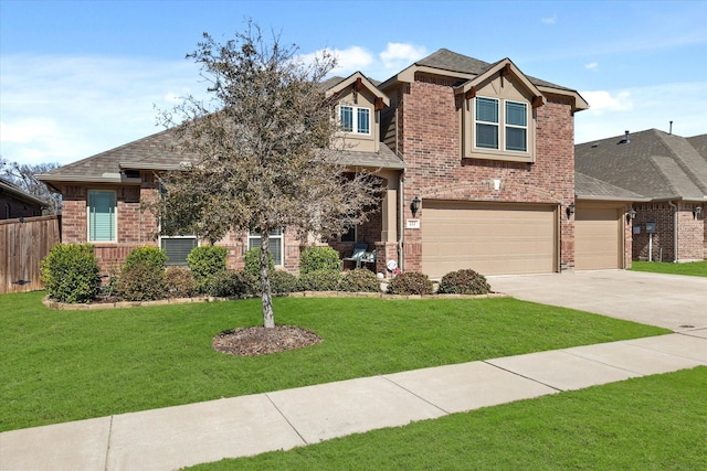 craftsman-style home with a front yard, brick siding, driveway, and fence