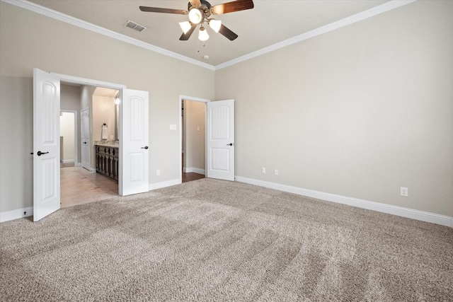 unfurnished bedroom featuring baseboards, light colored carpet, visible vents, and ornamental molding