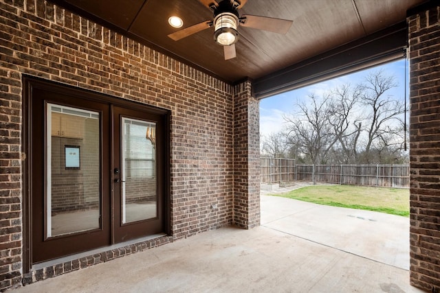 view of patio / terrace featuring a fenced backyard and a ceiling fan