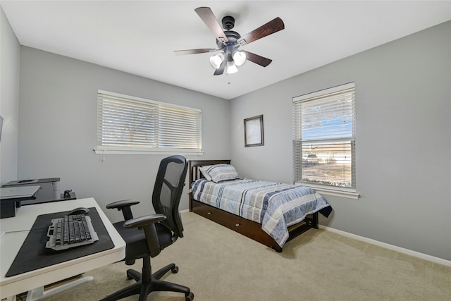 bedroom featuring ceiling fan, baseboards, and carpet flooring