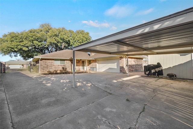 view of parking with a carport