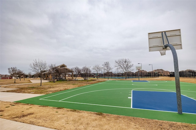 view of sport court with community basketball court and fence