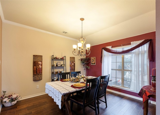 dining space featuring baseboards, crown molding, visible vents, and dark wood-type flooring