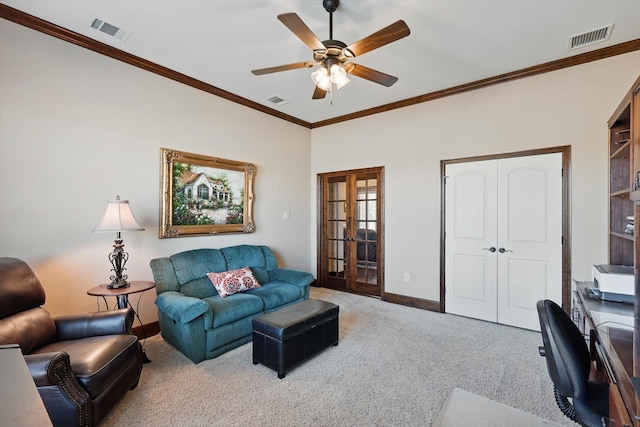 carpeted living room with visible vents and crown molding