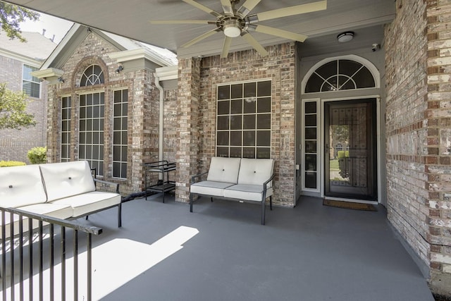 view of patio featuring an outdoor living space and a ceiling fan