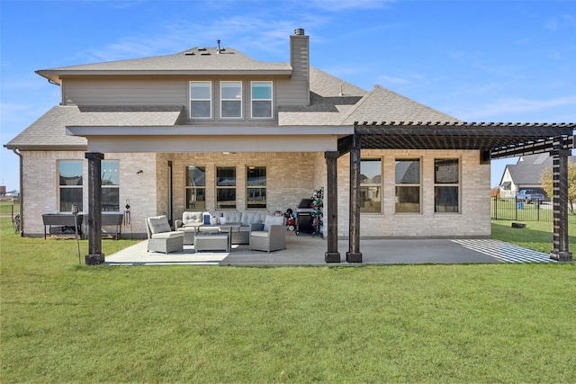 rear view of property featuring a lawn, a patio, outdoor lounge area, a pergola, and brick siding