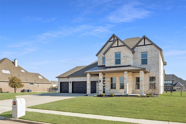 view of front of house featuring concrete driveway, metal roof, a standing seam roof, fence, and a front yard