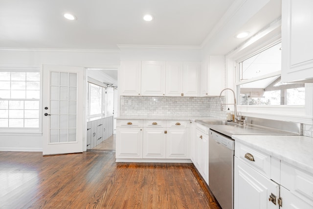1265 S Main St, Jacksboro, TX 76458 - kitchen featuring stainless steel dishwasher, a sink, light countertops, crown molding, and healthy amount of natural light