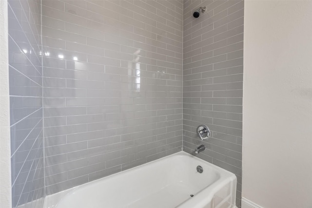 bathroom with shower / bathtub combination