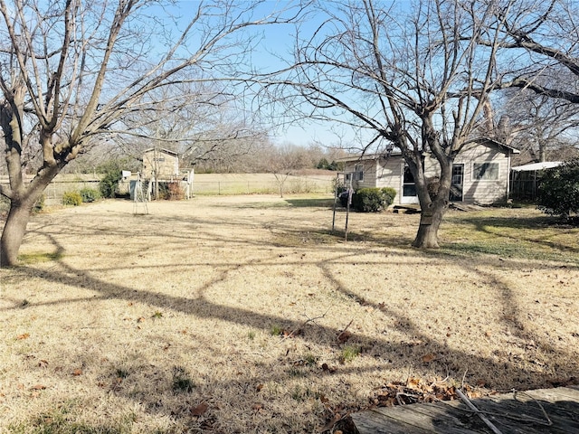 view of yard featuring fence