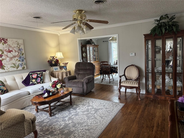 429 Broadway St, Bells, TX 75414 - living area with crown molding, ceiling fan, wood finished floors, and a textured ceiling