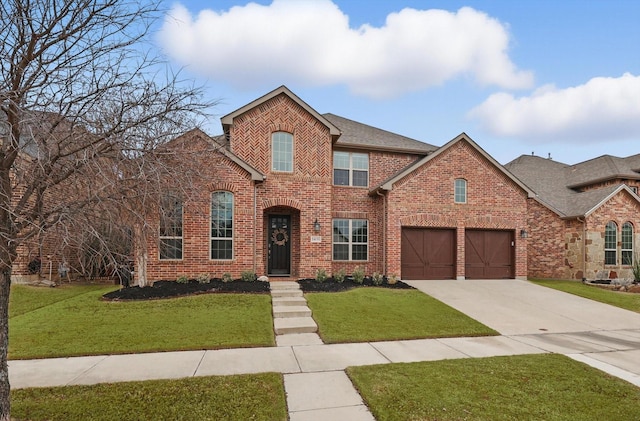 traditional home featuring a front yard, brick siding, and driveway