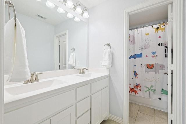 bathroom with visible vents, a sink, double vanity, tile patterned floors, and shower / bathtub combination with curtain