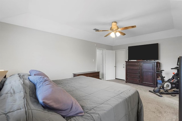 bedroom with light carpet and ceiling fan