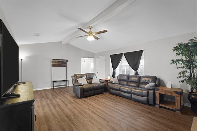 living room featuring visible vents, a ceiling fan, wood finished floors, baseboards, and vaulted ceiling with beams