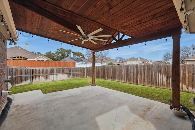 view of patio featuring ceiling fan and a fenced backyard