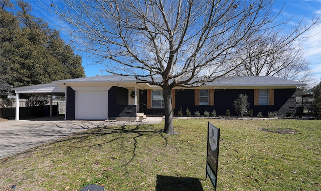 ranch-style house featuring a carport, a front yard, and driveway