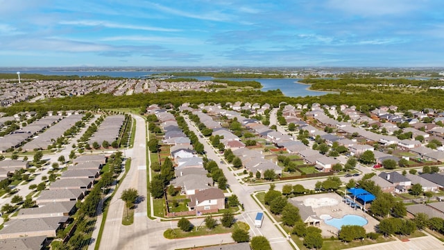 aerial view featuring a water view and a residential view