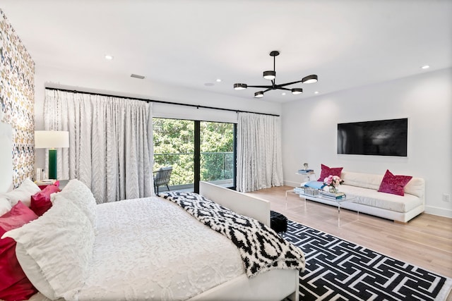 bedroom featuring recessed lighting, wood finished floors, a ceiling fan, baseboards, and visible vents