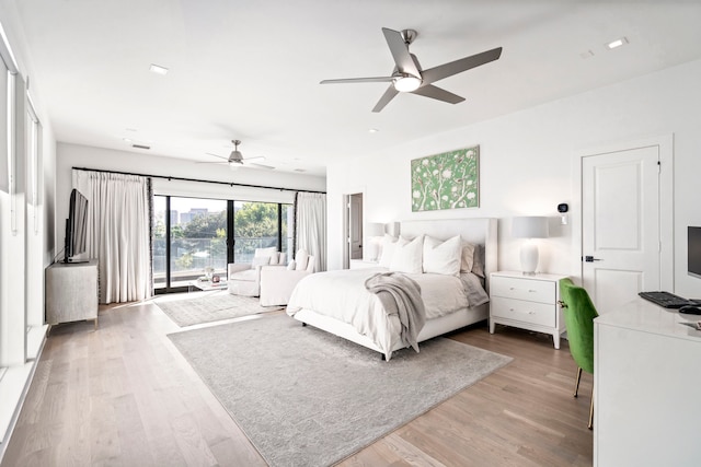 bedroom featuring access to exterior, ceiling fan, and light wood finished floors