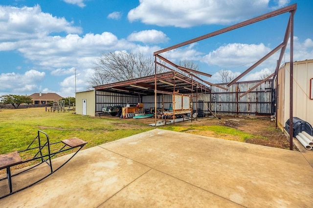 view of patio / terrace featuring an outbuilding and an outdoor structure