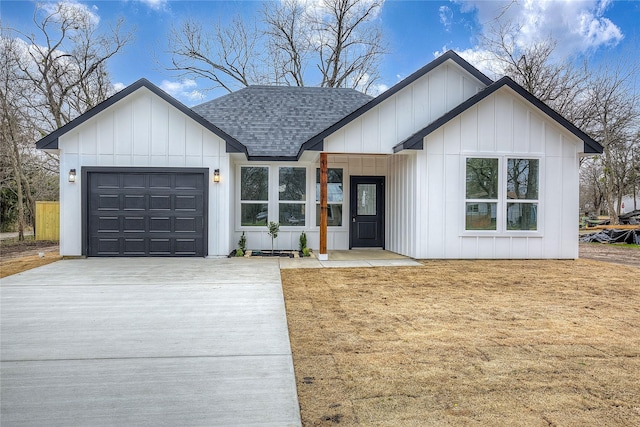 modern inspired farmhouse featuring driveway, roof with shingles, an attached garage, and board and batten siding