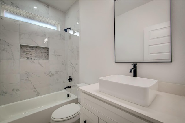 full bathroom featuring shower / bath combination, vanity, and toilet