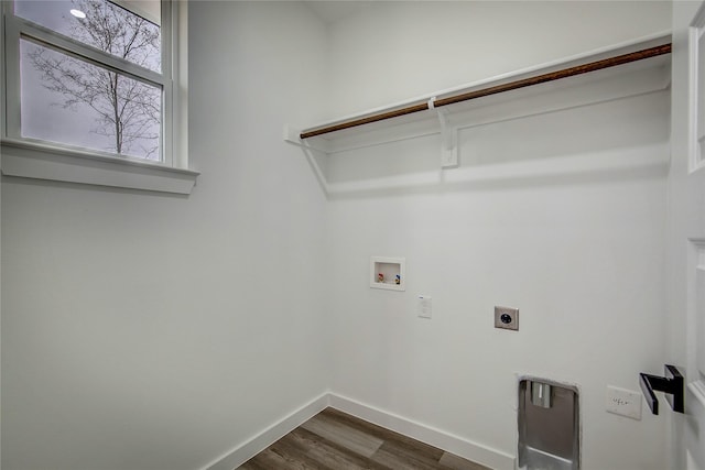 washroom featuring hookup for a washing machine, laundry area, dark wood-style flooring, baseboards, and electric dryer hookup