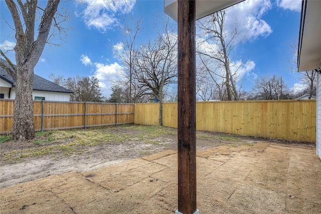 view of yard with a fenced backyard