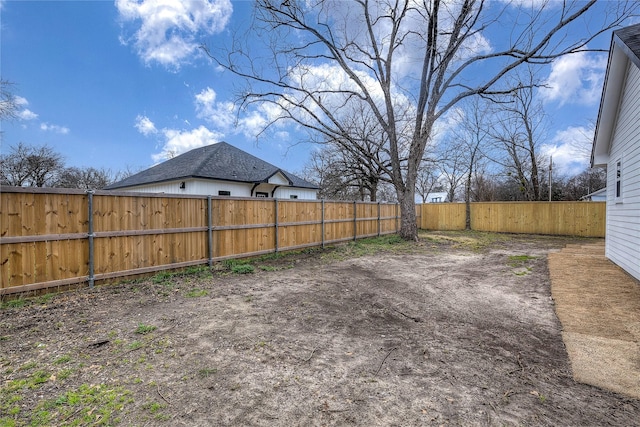 view of yard featuring a fenced backyard