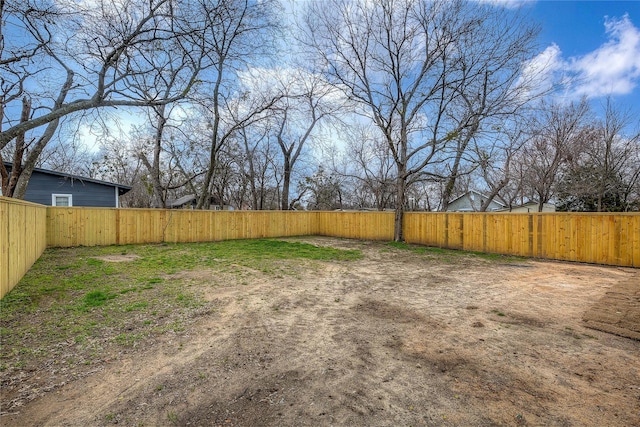 view of yard featuring fence