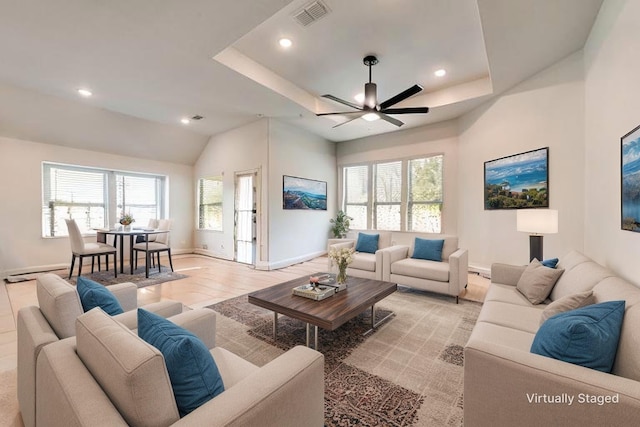 215 Tallgrass Dr, Lavon, TX 75166 - living area featuring healthy amount of natural light, a ceiling fan, recessed lighting, a baseboard heating unit, and a raised ceiling
