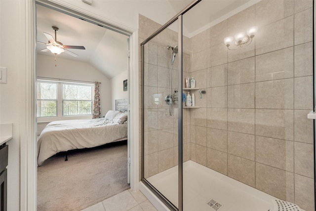 215 Tallgrass Dr, Lavon, TX 75166 - ensuite bathroom featuring vaulted ceiling, ceiling fan, a stall shower, tile patterned floors, and vanity