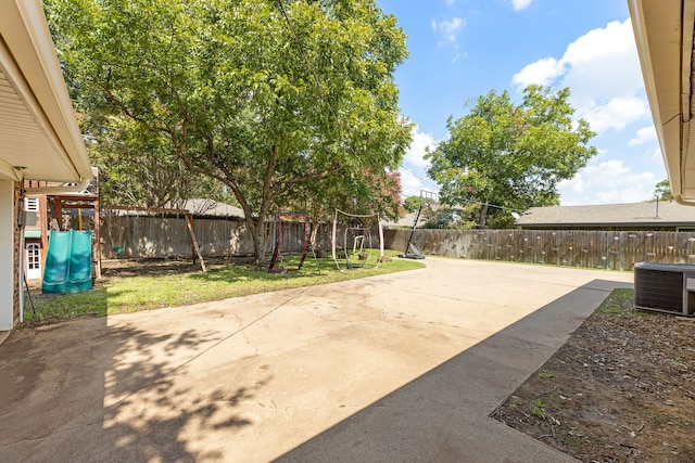 view of patio / terrace featuring central AC unit and a fenced backyard