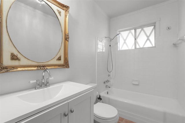 bathroom with toilet, vanity, crown molding, and shower / bathing tub combination