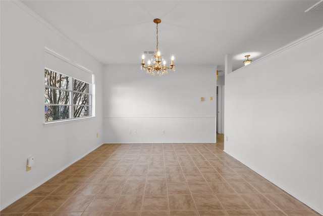 empty room featuring visible vents and an inviting chandelier