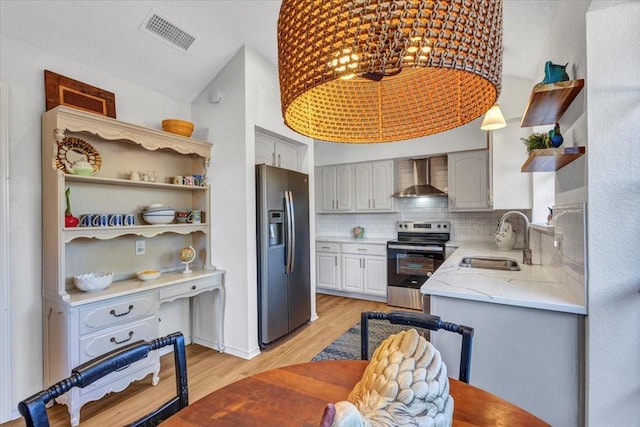 kitchen featuring open shelves, a sink, refrigerator with ice dispenser, electric stove, and wall chimney exhaust hood