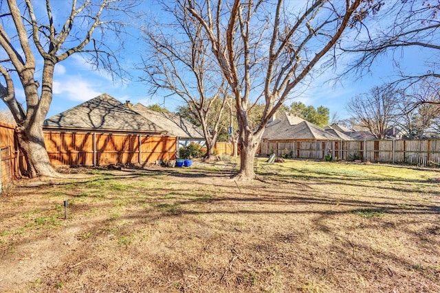 view of yard featuring a fenced backyard