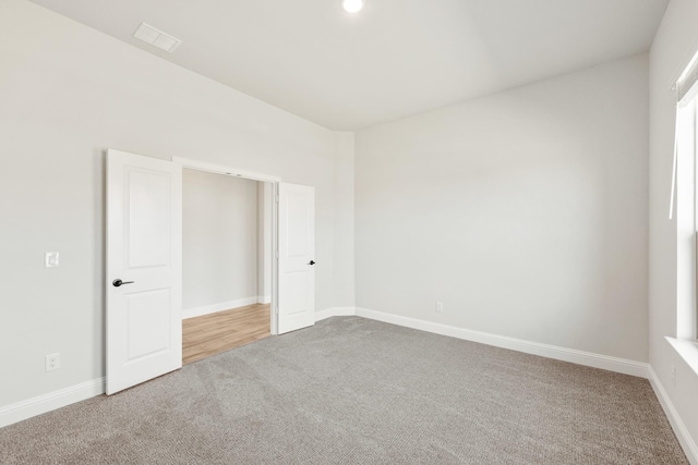 207 Cortese Ln, Alvarado, TX 76009 - unfurnished room with visible vents, baseboards, and carpet
