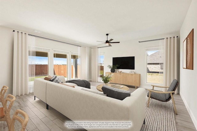 207 Cortese Ln, Alvarado, TX 76009 - living room with light wood-type flooring and ceiling fan