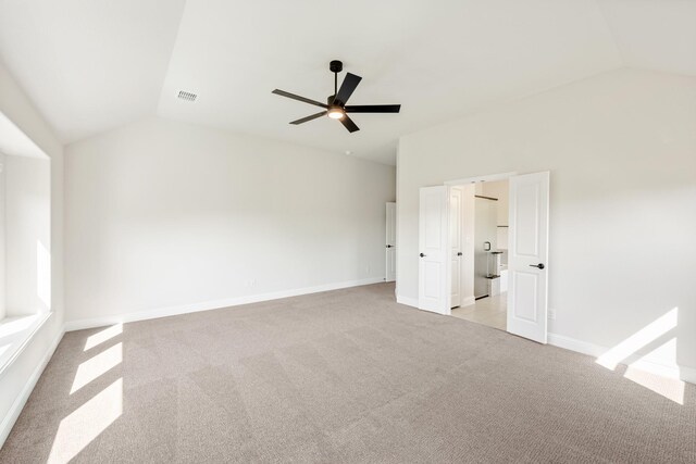 207 Cortese Ln, Alvarado, TX 76009 - unfurnished bedroom featuring visible vents, light colored carpet, baseboards, and lofted ceiling
