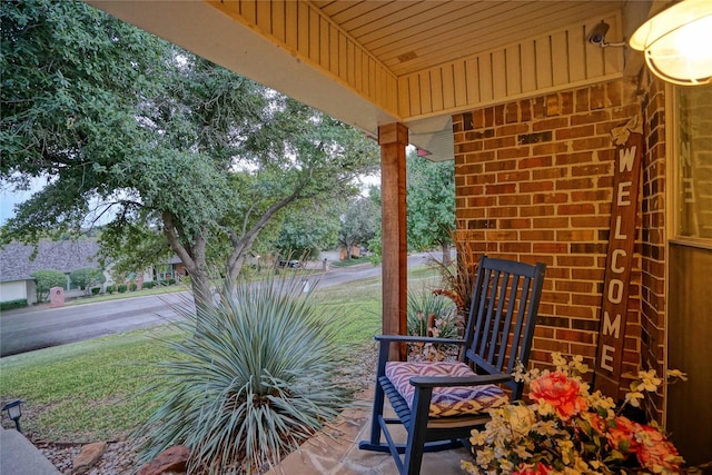 view of patio featuring a porch