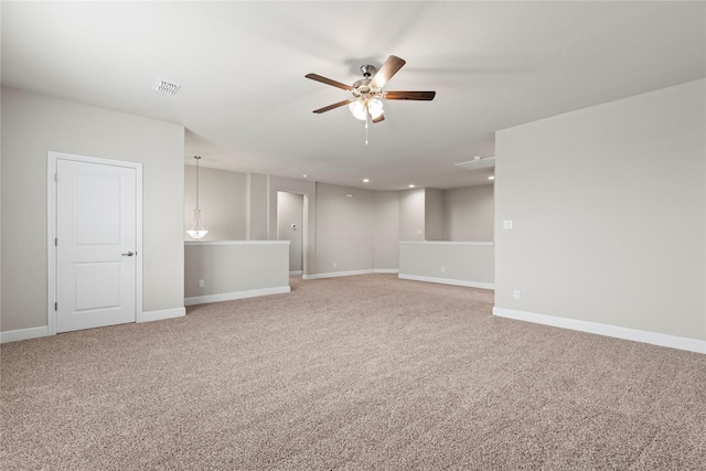 spare room with light carpet, baseboards, a ceiling fan, and recessed lighting