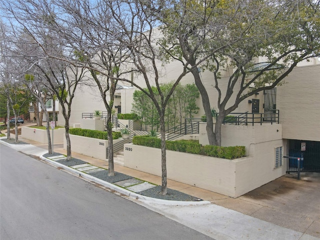 view of road with curbs and sidewalks