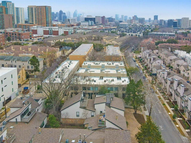 birds eye view of property with a view of city