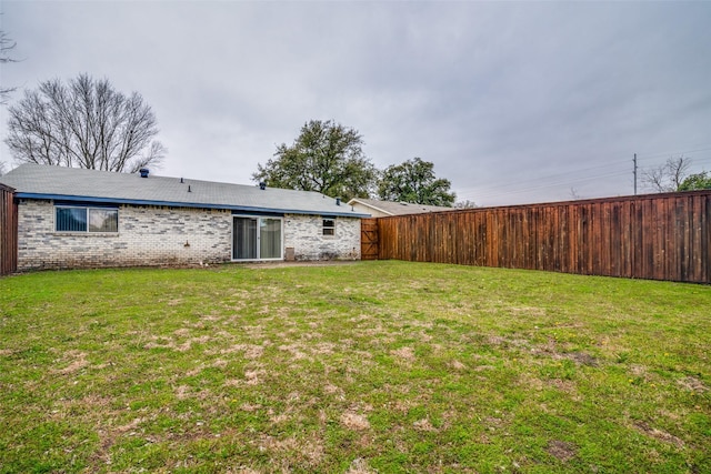 view of yard with fence