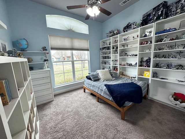 bedroom featuring a ceiling fan, carpet, and visible vents