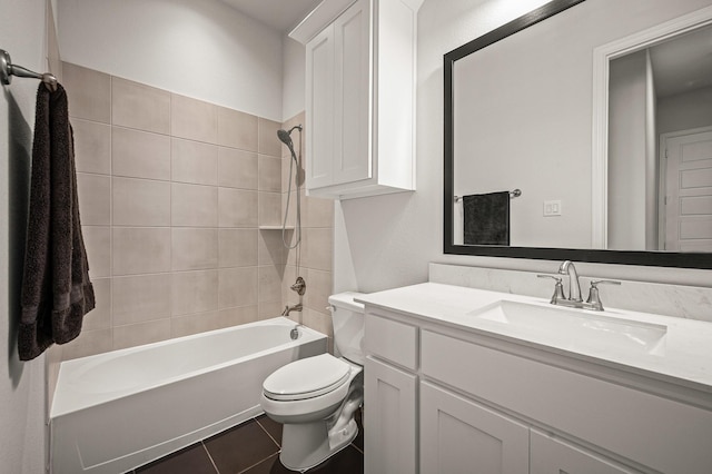 bathroom with vanity, tub / shower combination, tile patterned flooring, and toilet