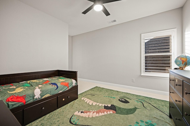 bedroom with baseboards, visible vents, ceiling fan, and carpet flooring